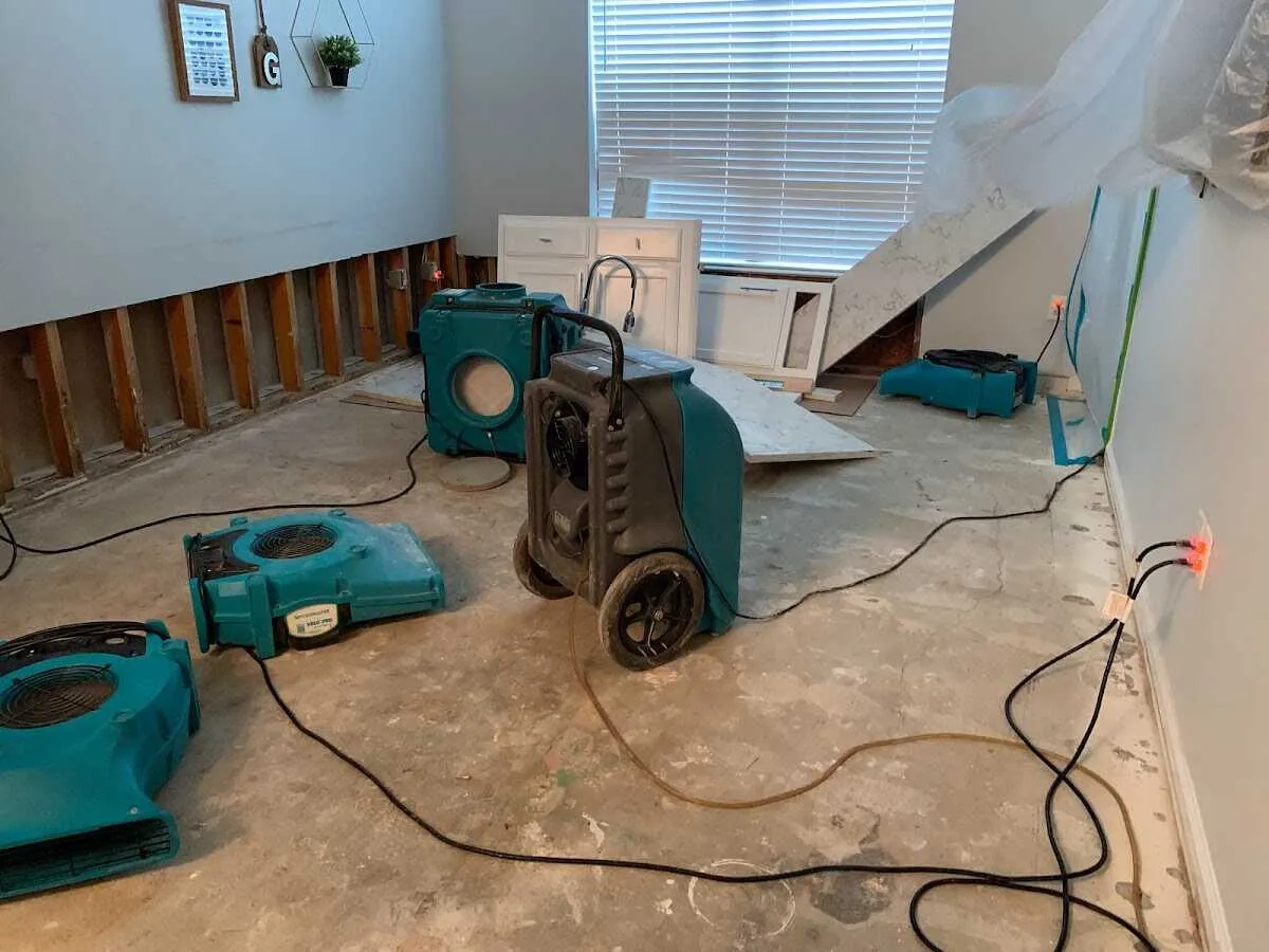 Dehumidifier in flood-cut room for Water Damage Restoration in Battlement Mesa